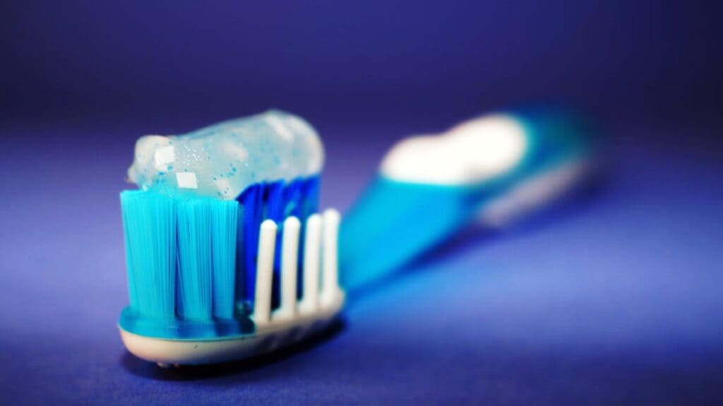 A view of a toothbrush with gel toothpaste on top