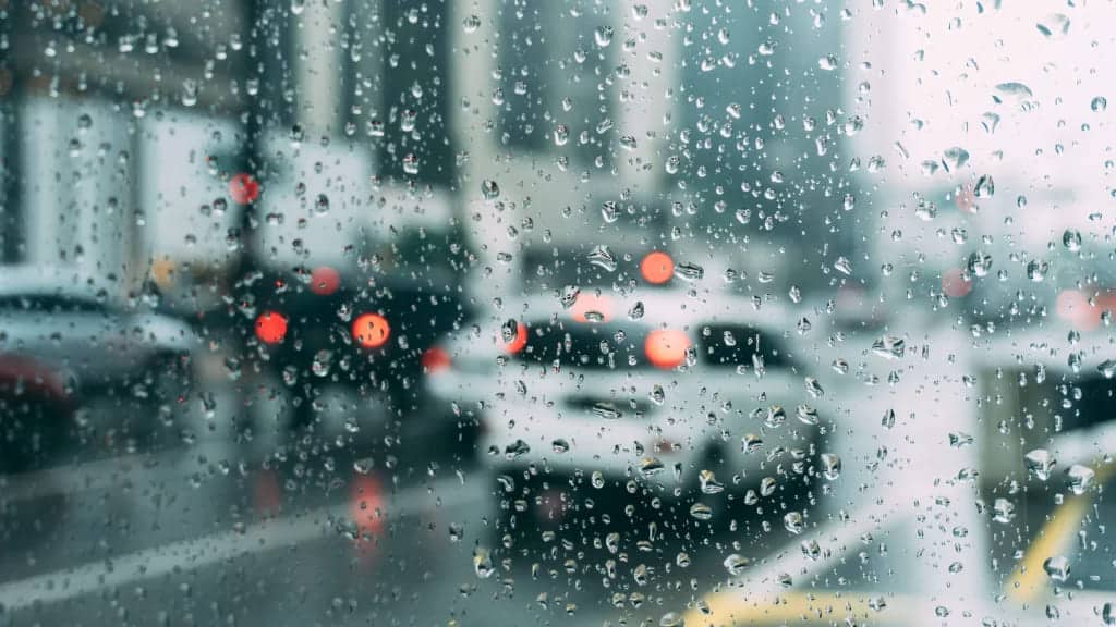 water droplets on the car window with blurried vision