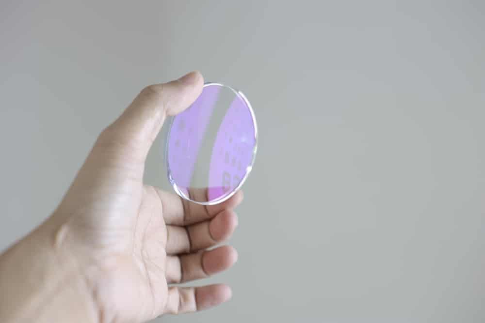 Lens Glasses Eyeglasses Lenses In Hand On Grey Background Lenses