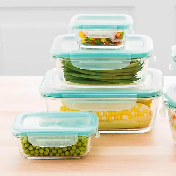 OXO Good Grips Glass Storage Container Set with stored peas, maize, beans and salad