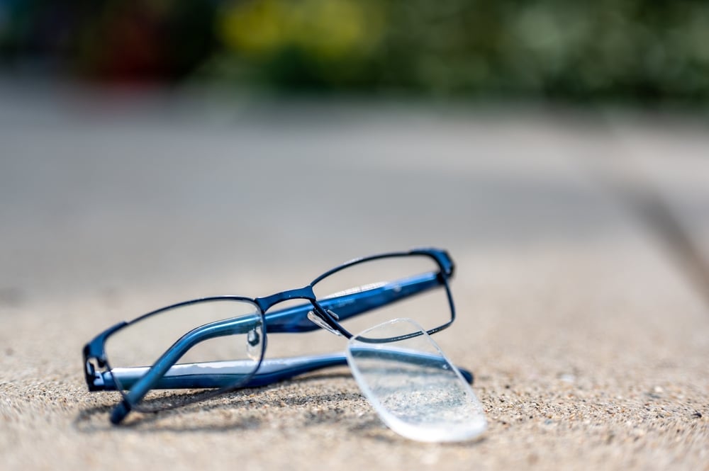 Selective Focus On Damaged Glasses With Scratched Lens Popped Out