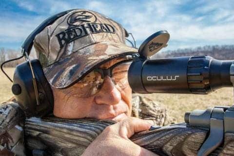 a military shooter wearing shooting glasses