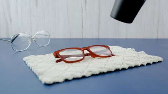 heating plastic frames using a hair dryer to remove lenses