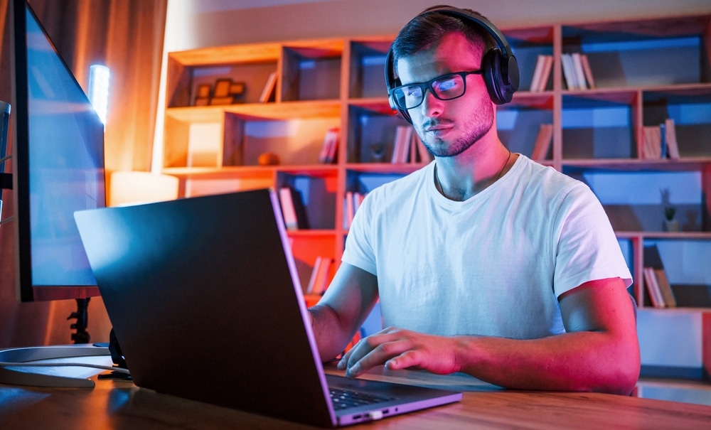 Focused By Work Man In Glasses And White Shirt Is