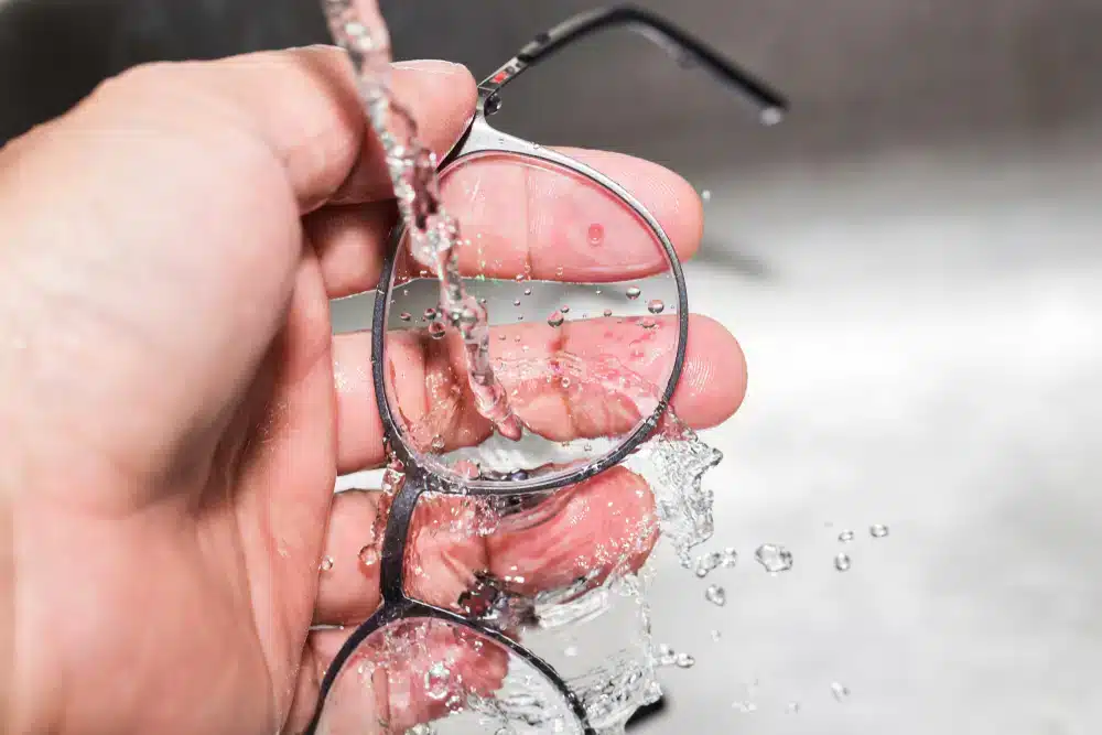 cleaning glasses under water