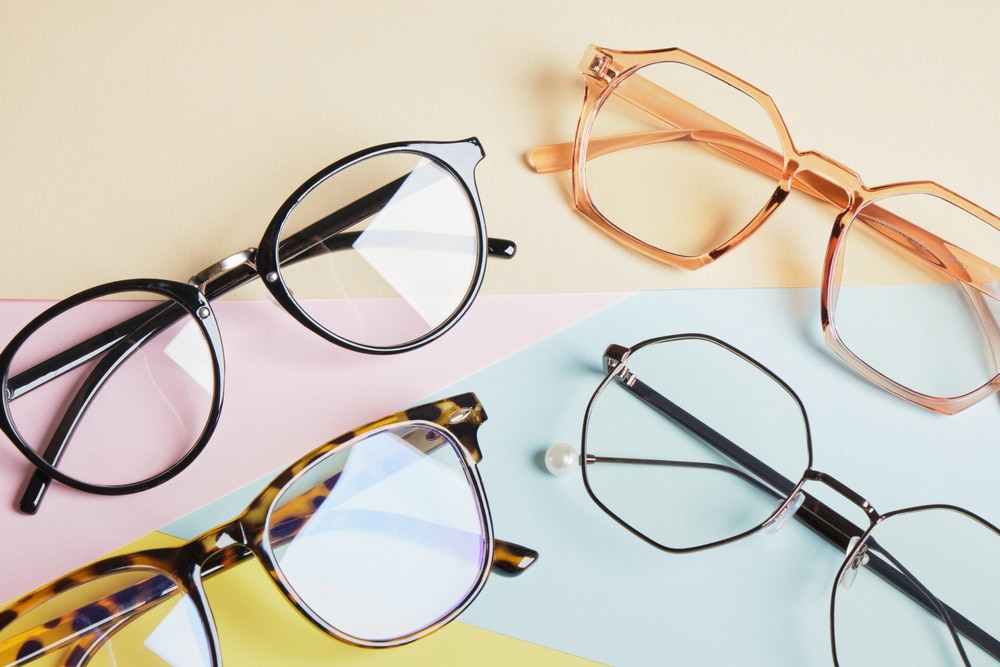 Multiple Eyeglasses On A Multicolored Background Of Pastel Colors Geometric