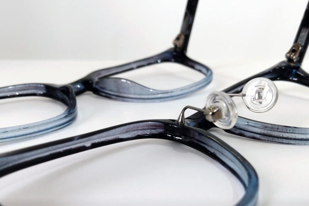A close view of glasses with nose pads on A close view of glasses with nose pads on