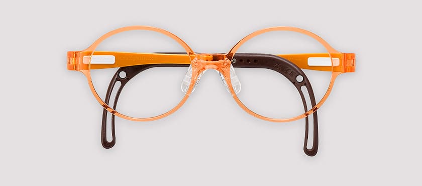 A view of circular orange frame glasses A view of circular orange frame glasses