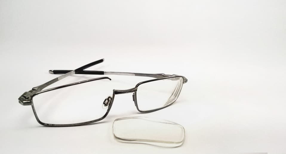 glasses with a broken frame and lenses popped out glasses with a broken frame and lenses popped out